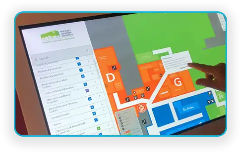 Hospital healthcare wayfinding kiosk showing a color coded interactive floor plan